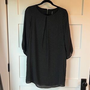 H&M Black Long Sleeve Polka Dot Dress with flattering front pleat detail.